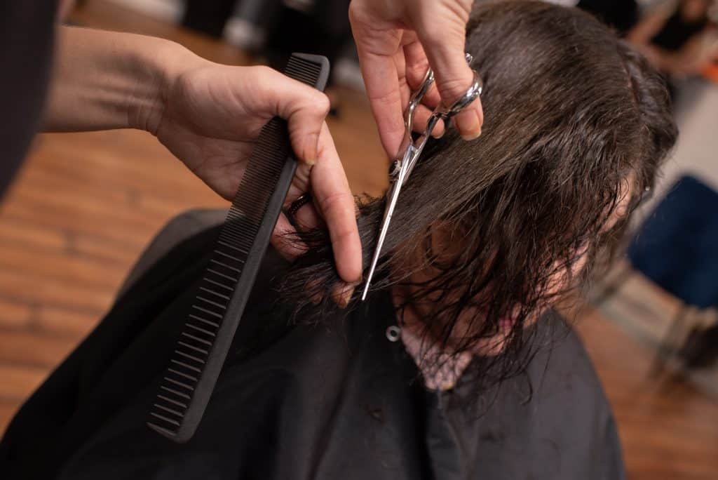 Woman having her hair cut at a salon